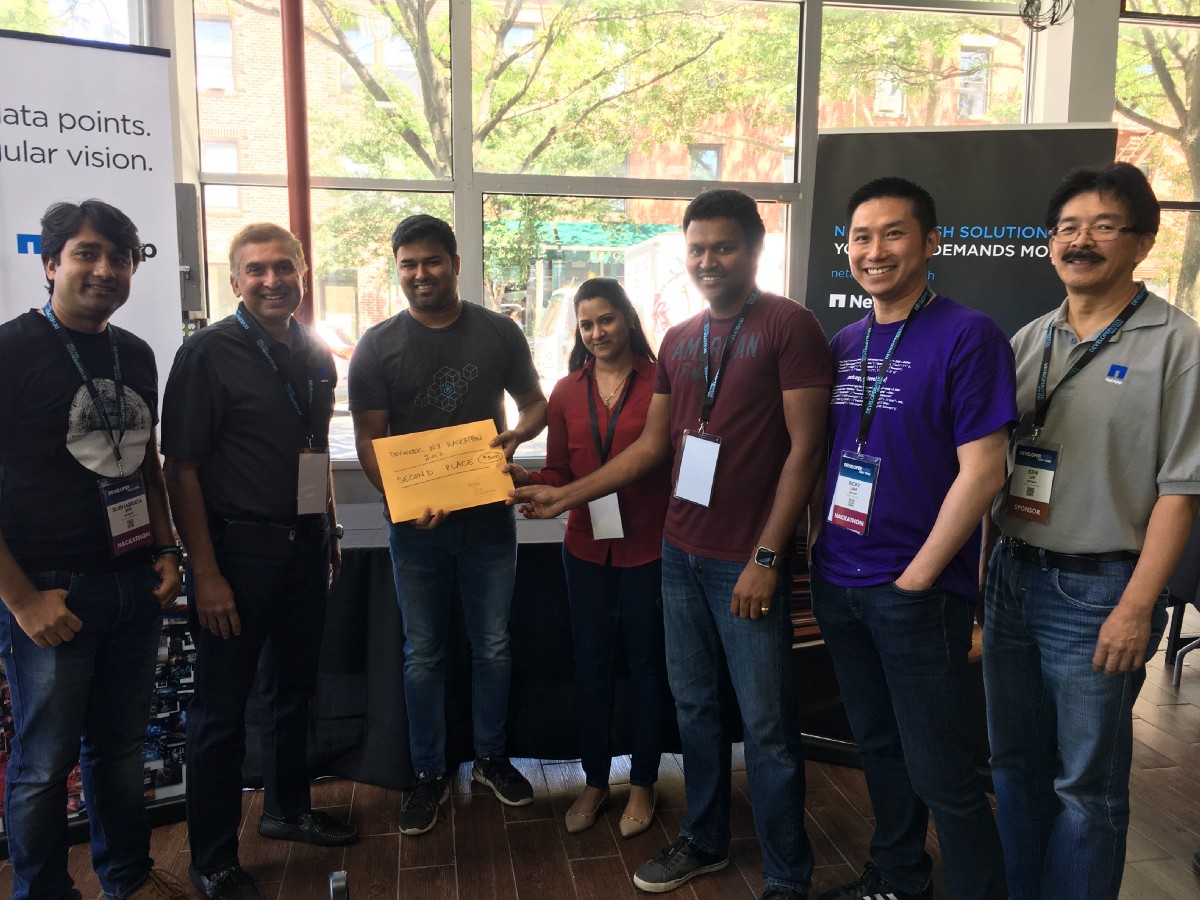 Receiving hackathon prize from Team Netapp